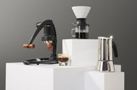 Flair 49 Pro manual espresso maker, Hario Switch pour-over dripper, and Bialetti Venus moka pot