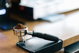 Portafilter on tamping mat - Photo by Charles Lundgren for Unsplash