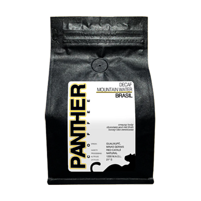 Capturing picture of the packaging for Panther Coffee Decaf Mountain Water Brazil coffee roast.