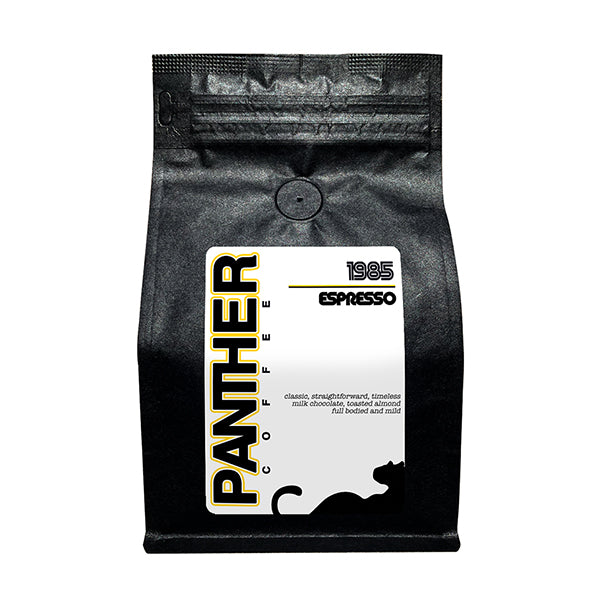 Exceptional picture of the packaging for Panther Coffee 1985 Espresso coffee roast.